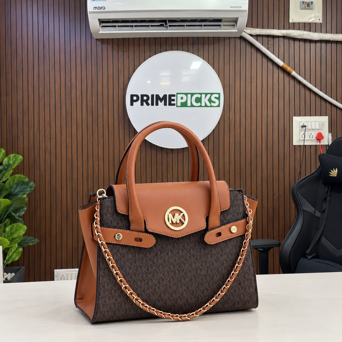 Michael Kors Carmen flap handbag in Brown Signature at PrimePicks office