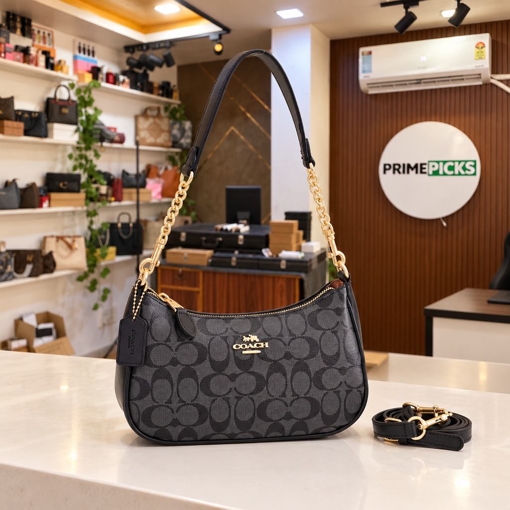 Coach Teri shoulder bag in Charcoal/Black Signature at the PrimePicks office