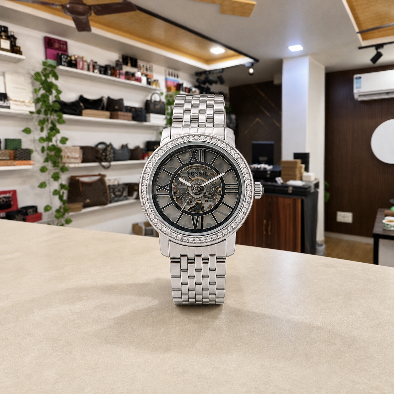 Fossil Curiosity women’s silver skeleton watch in Primepicks office