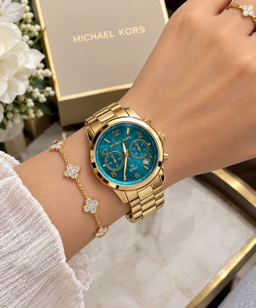 Michael Kors MK5815 gold-tone women’s watch worn on the wrist