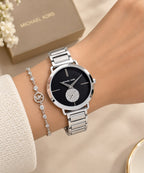 Michael Kors Portia MK3638 silver-tone women’s watch worn on the wrist