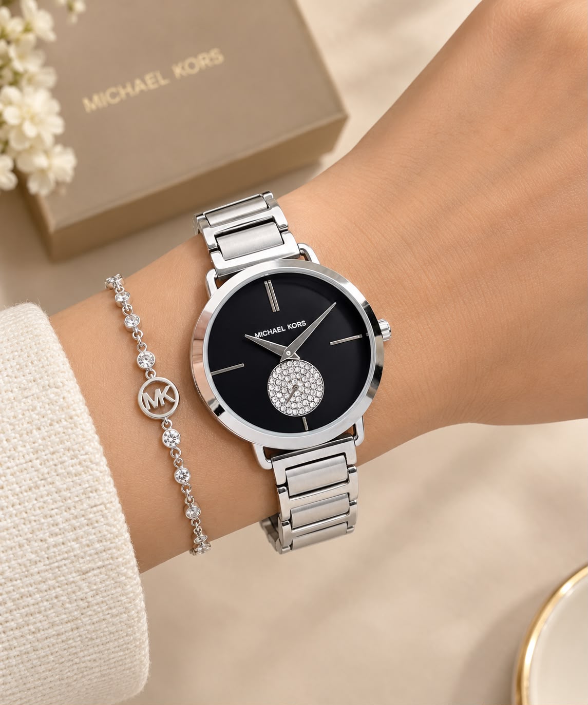 Michael Kors Portia MK3638 silver-tone women’s watch worn on the wrist