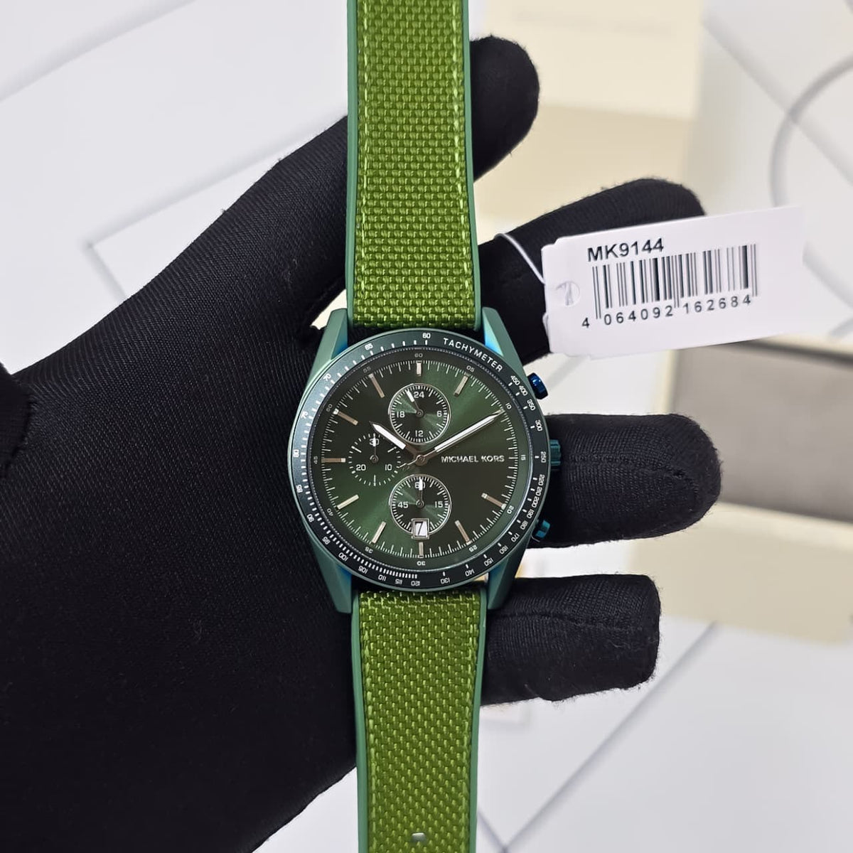 Original supplied Michael Kors MK9144 green watch with model tag