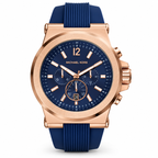 Michael Kors Dylan chronograph in rose gold and navy blue on a white background