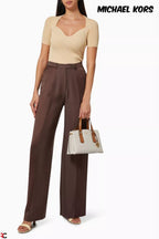 Michael Kors Emma Vanilla Signature handbag full lifestyle view