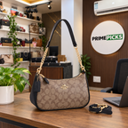 Coach Teri shoulder bag in Khaki/Black Signature at the PrimePicks office