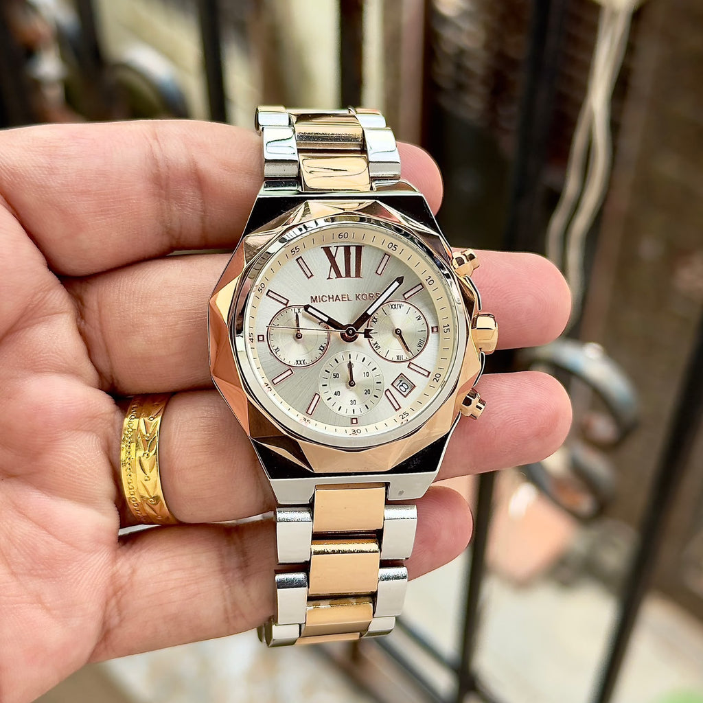 Original supplier image of silver and rose-gold-tone Michael Kors watch