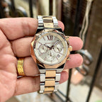 Original supplier image of silver and rose-gold-tone Michael Kors watch