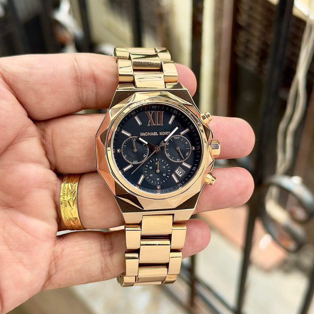Original supplier image of gold-tone Michael Kors watch with black dial