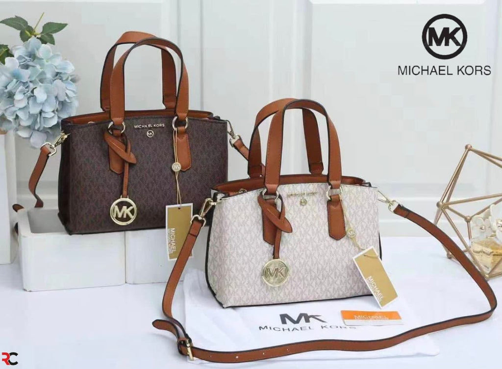 Michael Kors Emma handbags in Brown and Vanilla Signature
