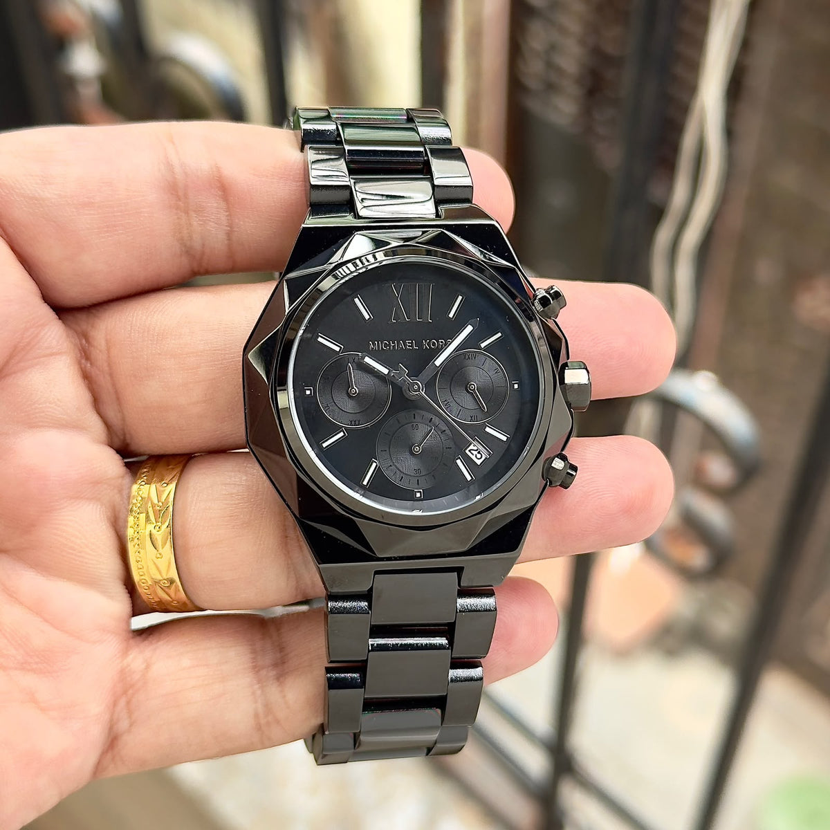 Original supplier image of gunmetal-tone Michael Kors watch with black dial