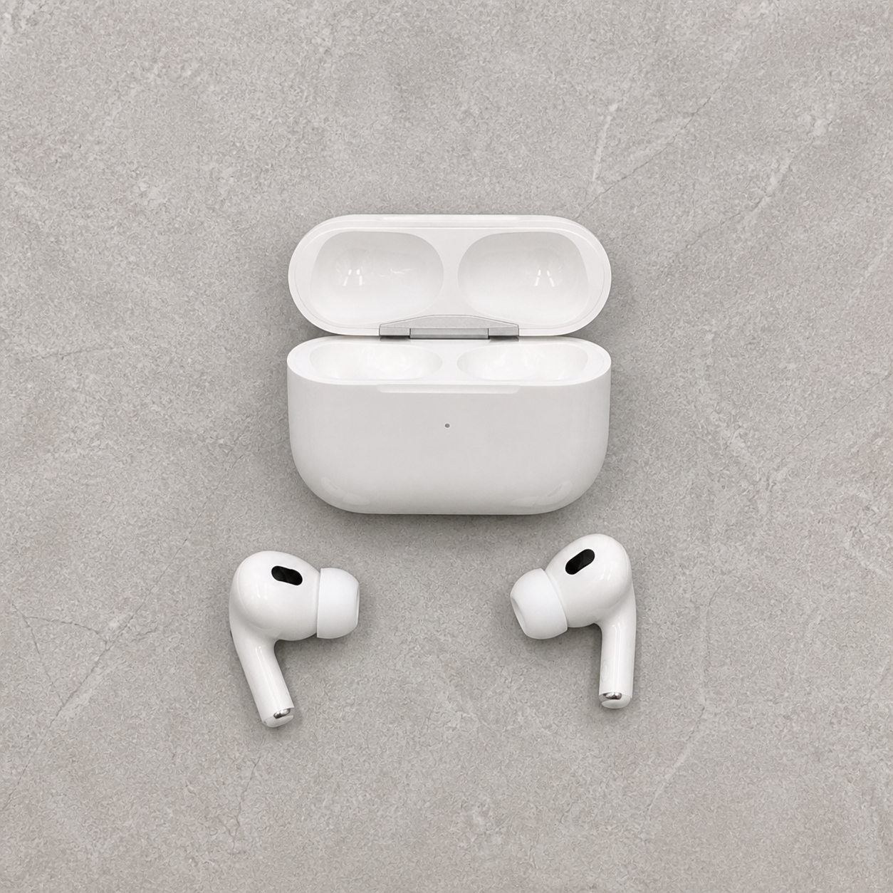 PrimePicks wireless earbuds and open charging case — full set