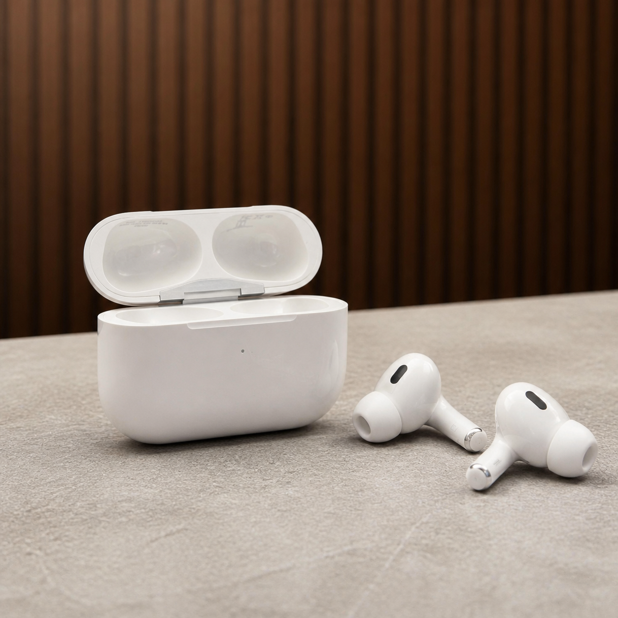 PrimePicks white wireless earbuds beside open charging case, alternate view