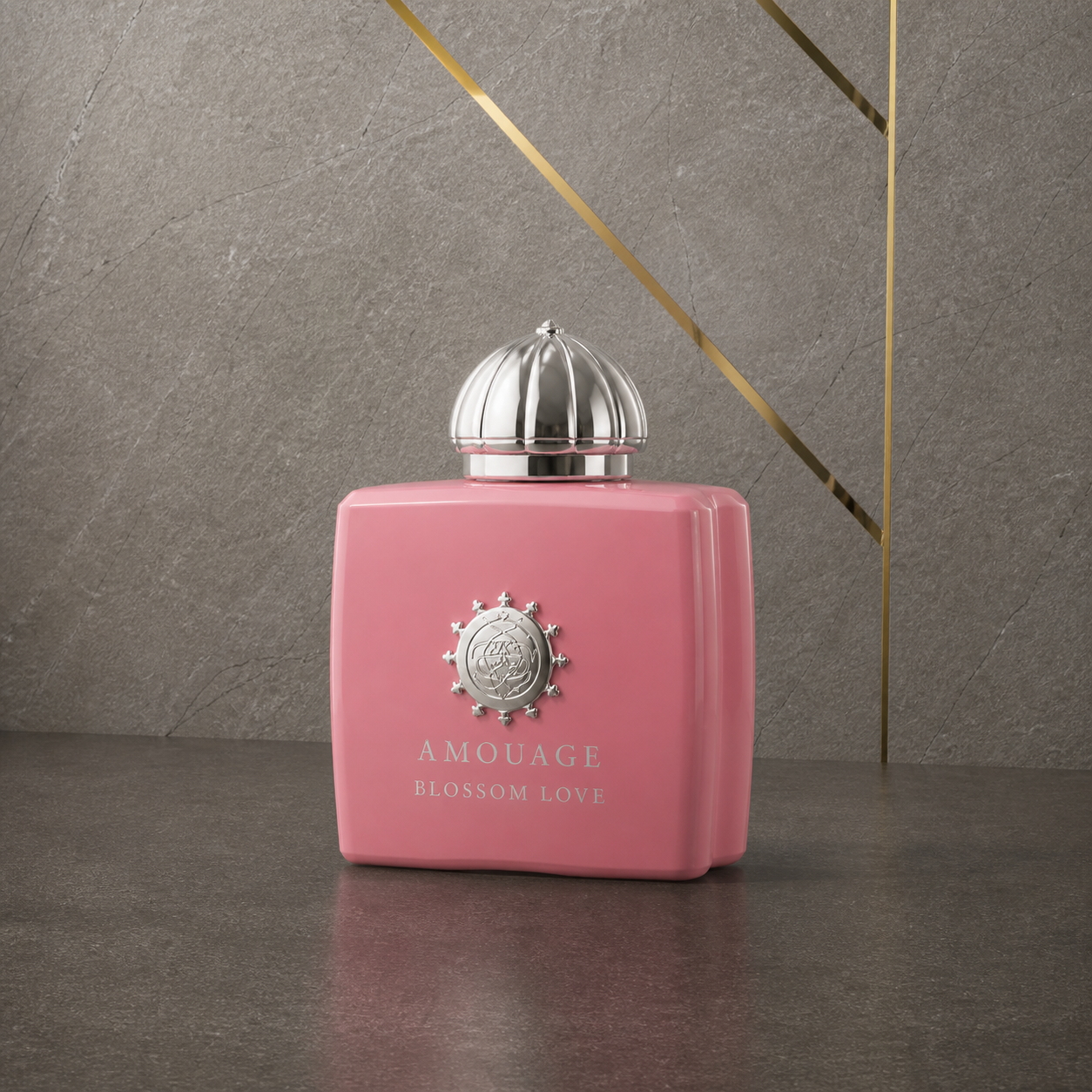Amouage Blossom Love bottle against the PrimePicks stone wall