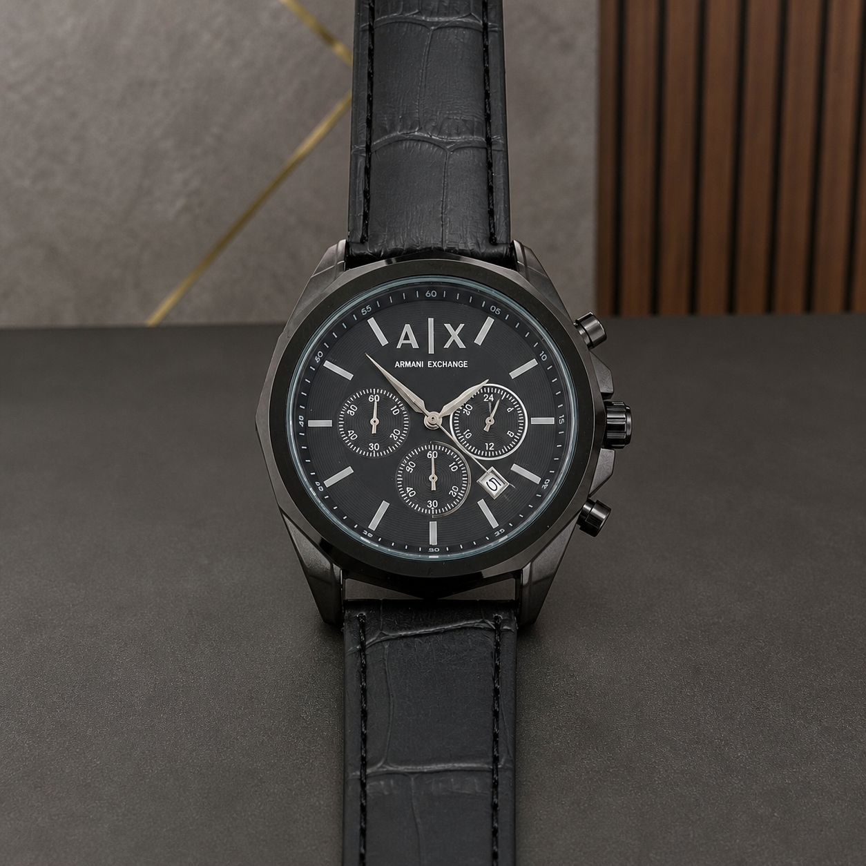 PrimePicks black three-register replica-style watch, slight angle view