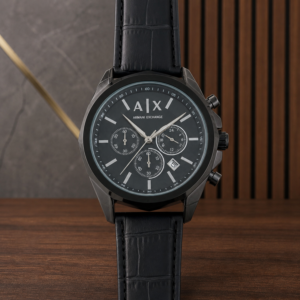 PrimePicks black three-register replica-style watch in the PrimePicks office setting