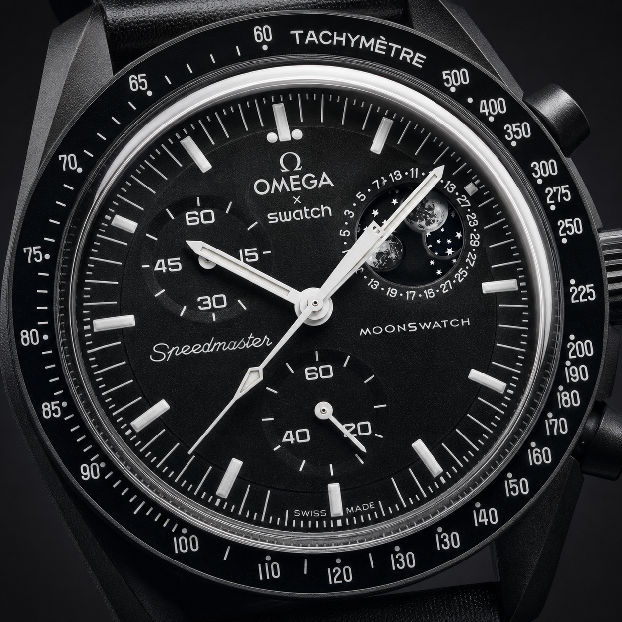 Black moonphase chronograph-style watch angled view