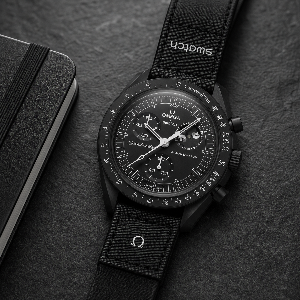 Black moonphase chronograph-style watch lifestyle view