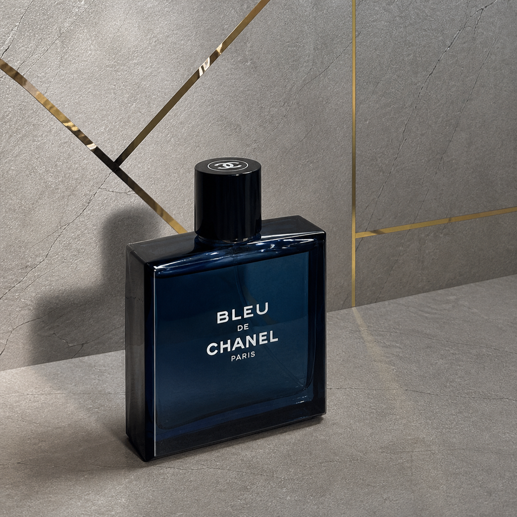 Bleu de Chanel perfume bottle against the PrimePicks stone wall