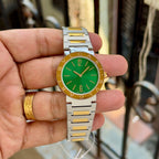 Hand-held view of the Bvlgari Bvlgari green-dial two-tone women’s watch