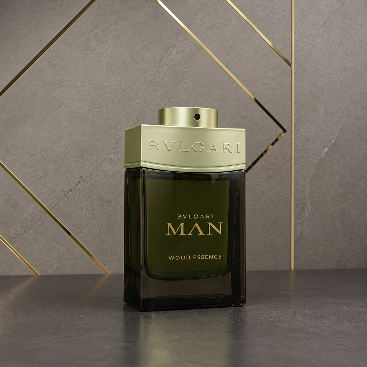 Bvlgari Man Wood Essence Eau de Parfum 100ml bottle against the PrimePicks stone wall