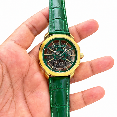 BVLGARI Octo Roma Tourbillon automatic watch in green and gold on a white background