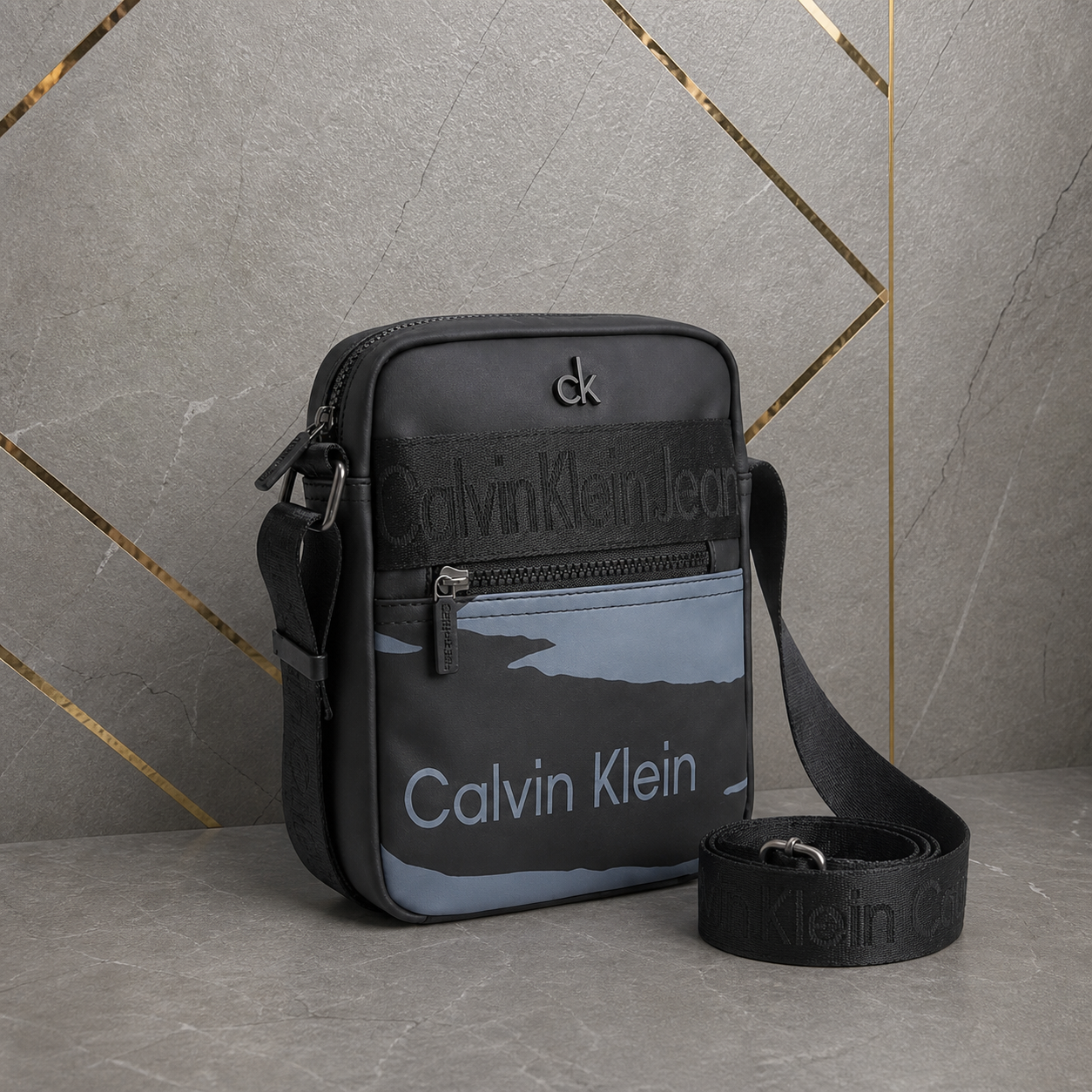 Calvin Klein Jeans black grey-panel messenger bag three-quarter view