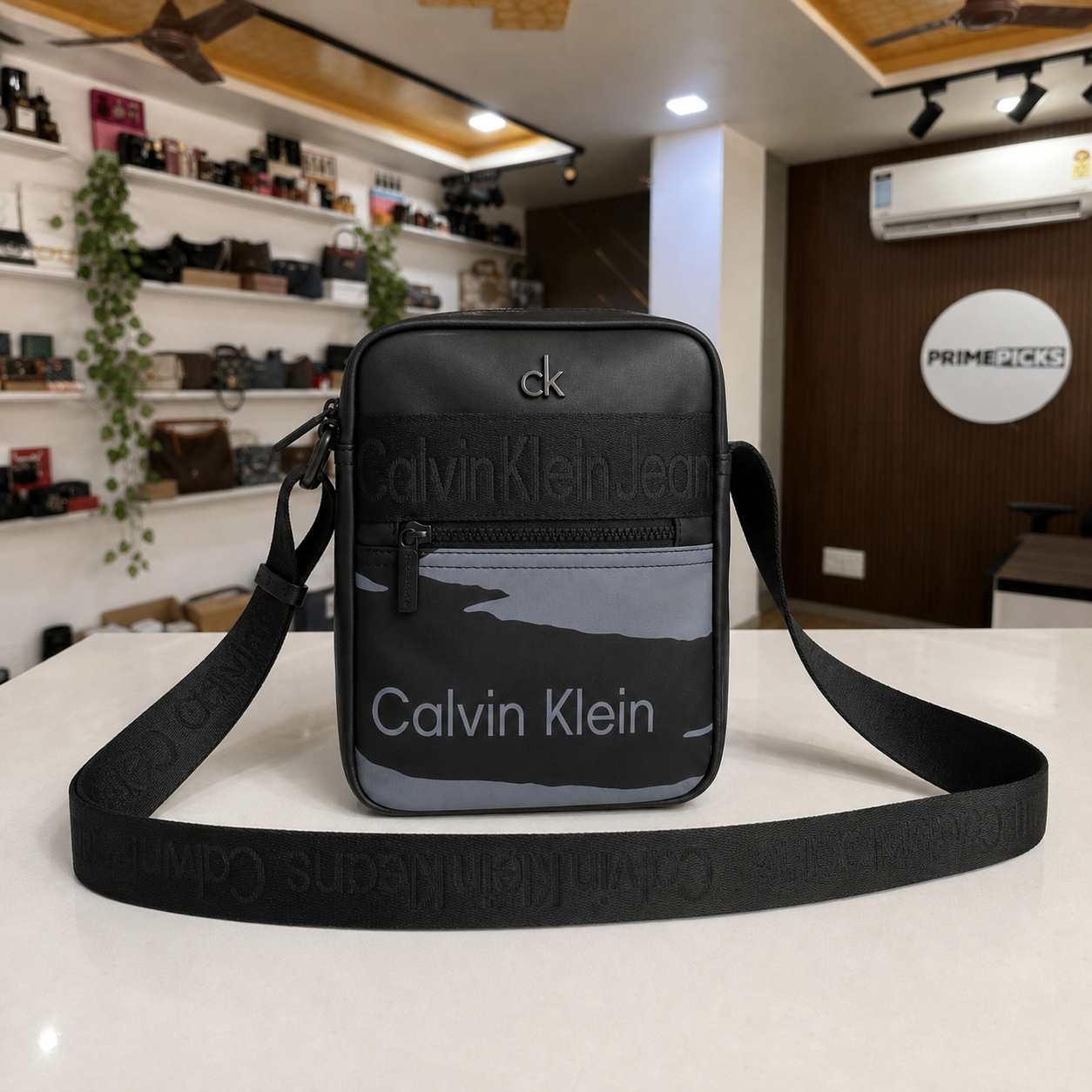 Calvin Klein Jeans grey-panel messenger bag in Primepicks boutique