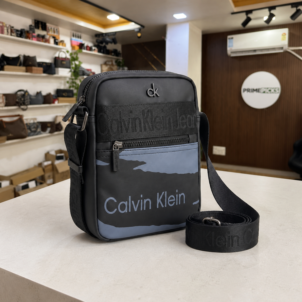 Calvin Klein Jeans messenger bag side and adjustable strap detail