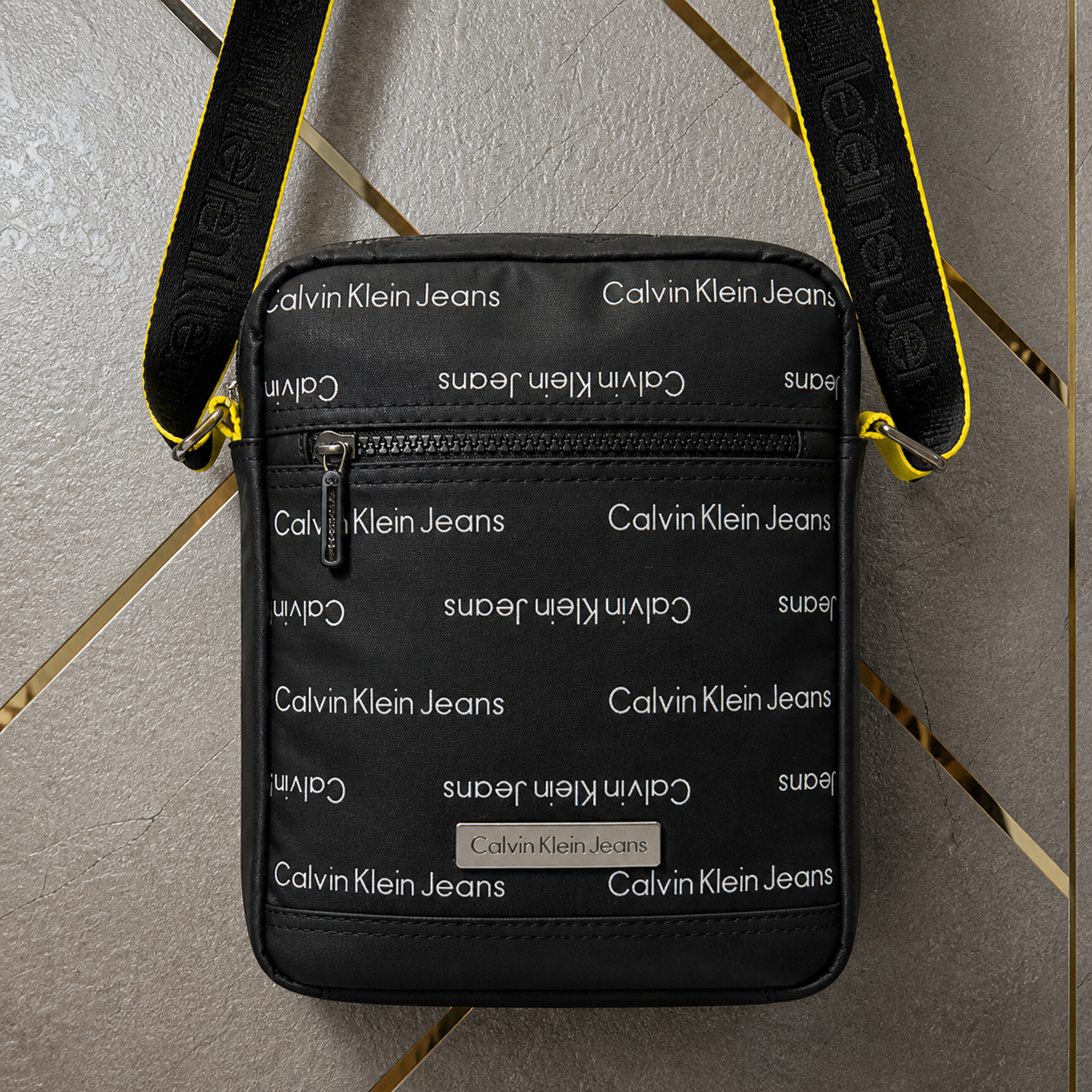 Calvin Klein Jeans messenger bag front zip and logo details