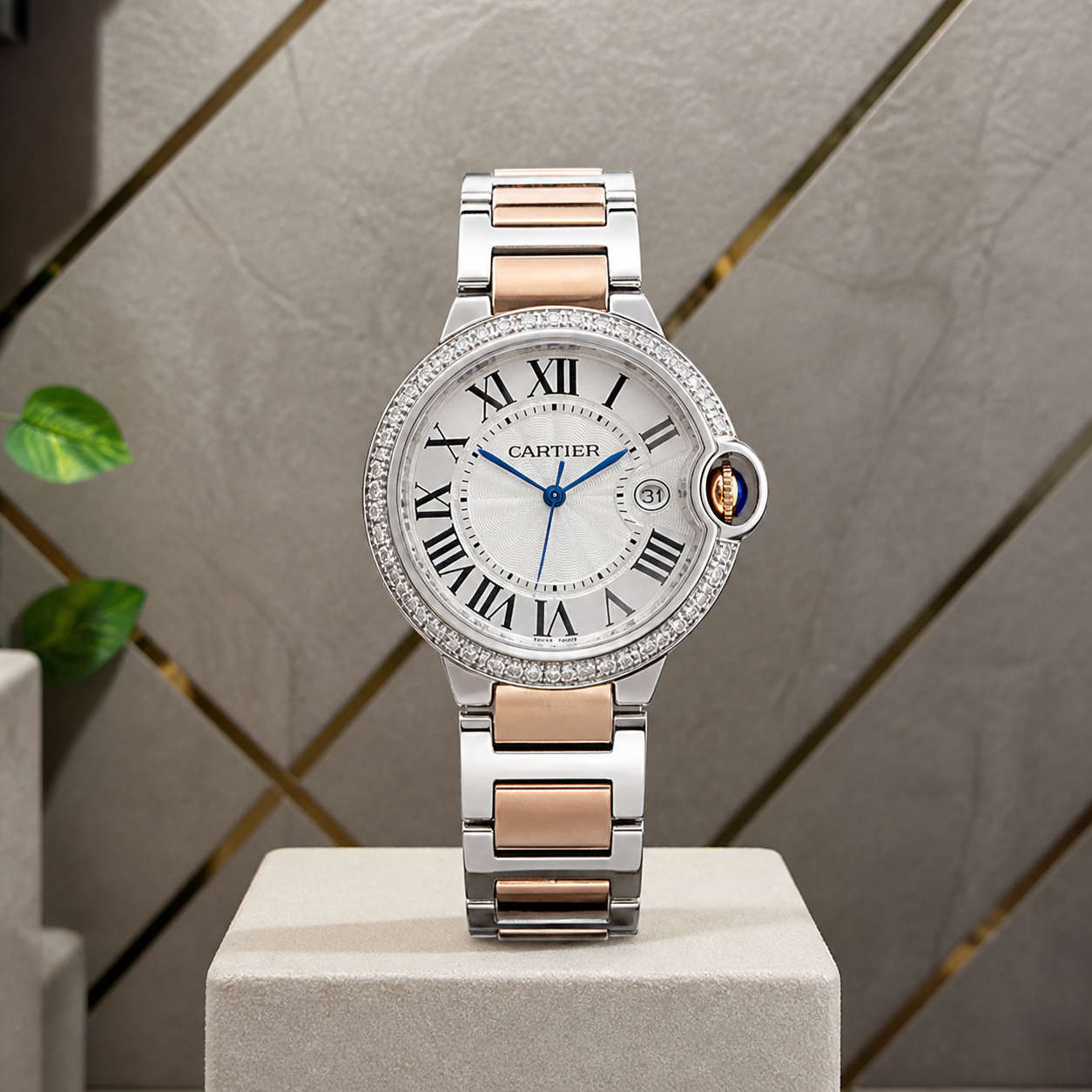 Close-up of Cartier Ballon Bleu silver dial crystal-bezel two-tone watch