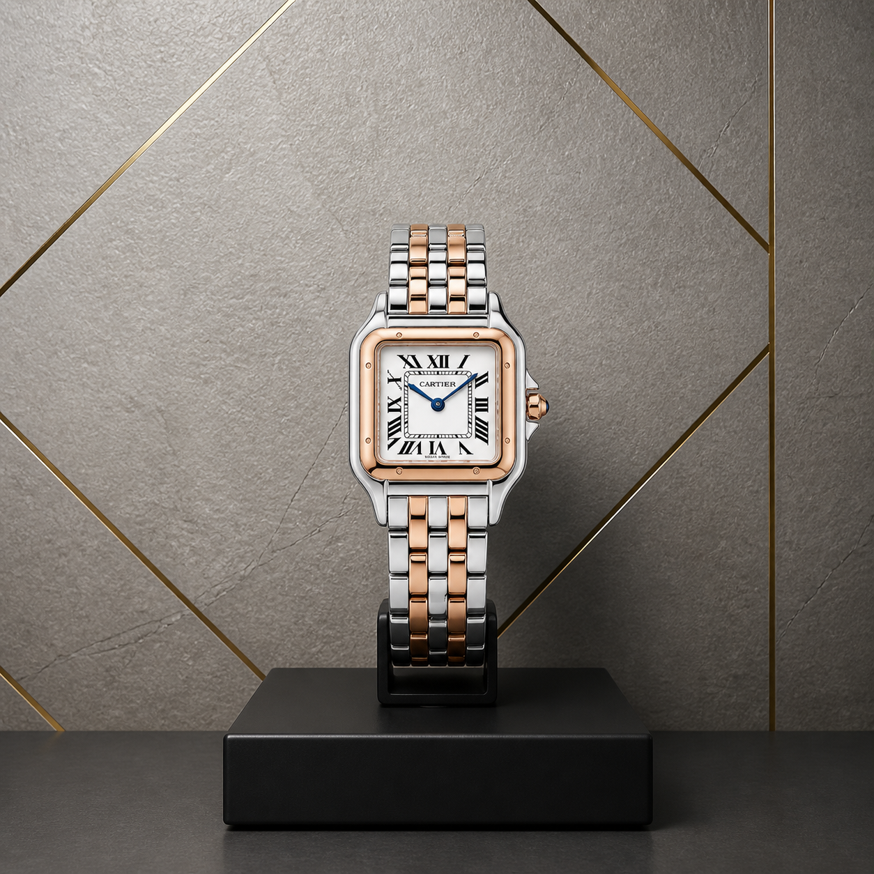 Cartier square women’s watch with white dial against the grey and gold Primepicks office wall