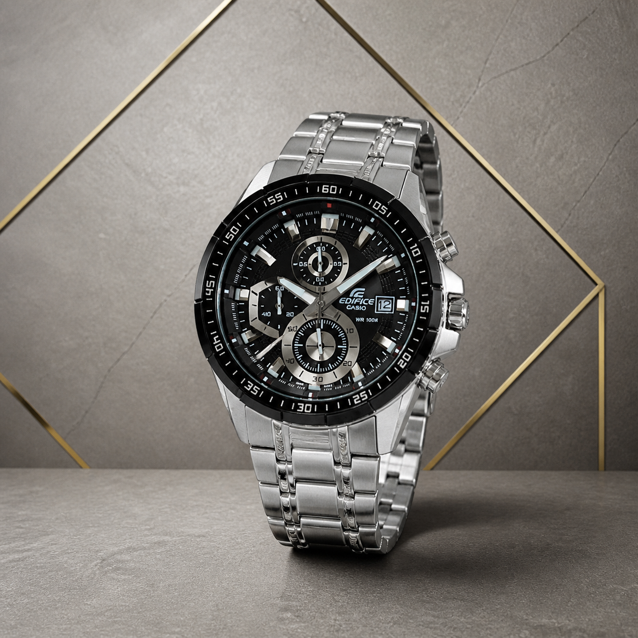 Casio Edifice EFR-539DY black chronograph watch on grey geometric office wall