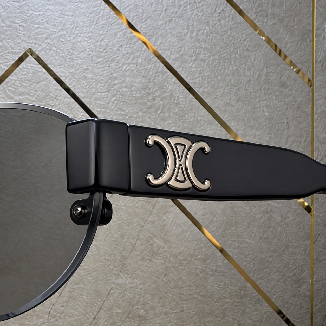 Celine grey rimless sunglasses temple emblem detail at PrimePicks