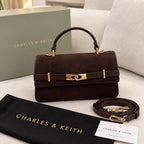 Brown Charles & Keith Arlet bag front view with shoulder strap and dustcover