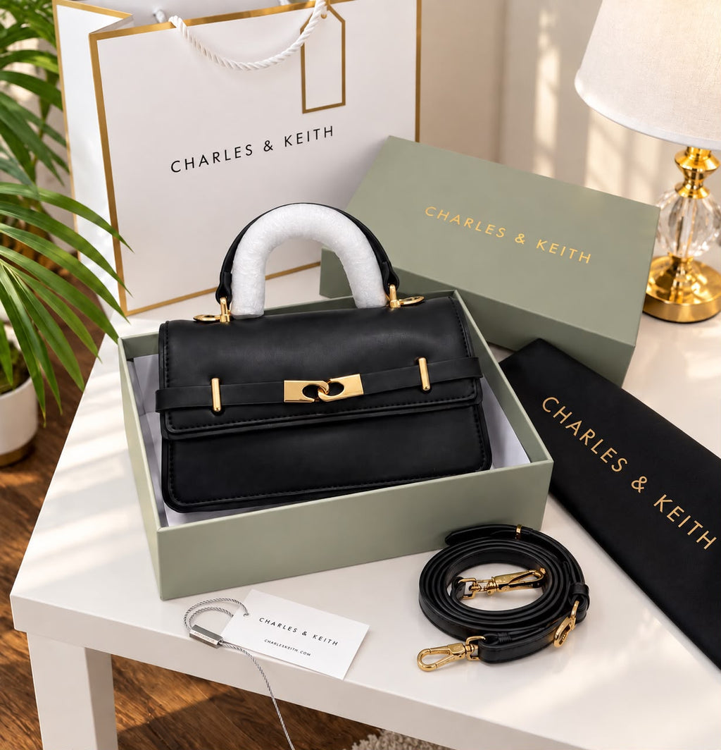 Black Charles & Keith Arlet bag with supplied brand box, dustcover and shoulder strap