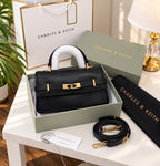 Black Charles & Keith Arlet bag with supplied brand box, dustcover and shoulder strap