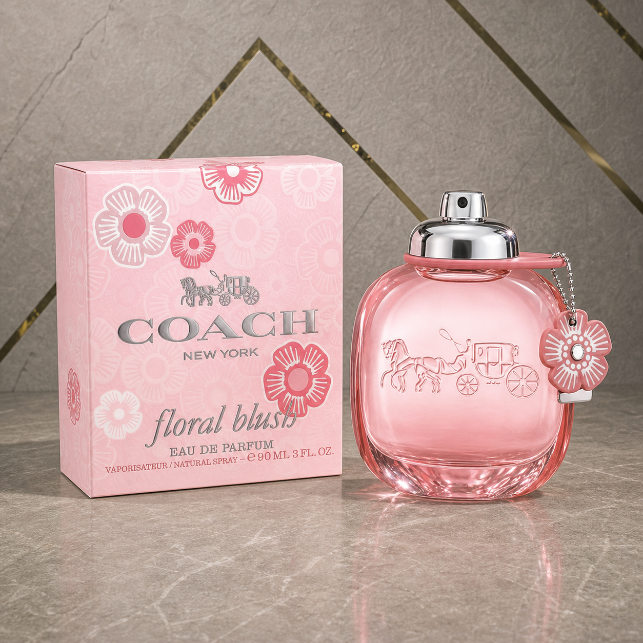 Coach Floral Blush Eau de Parfum 90ml against the PrimePicks grey stone and gold wall