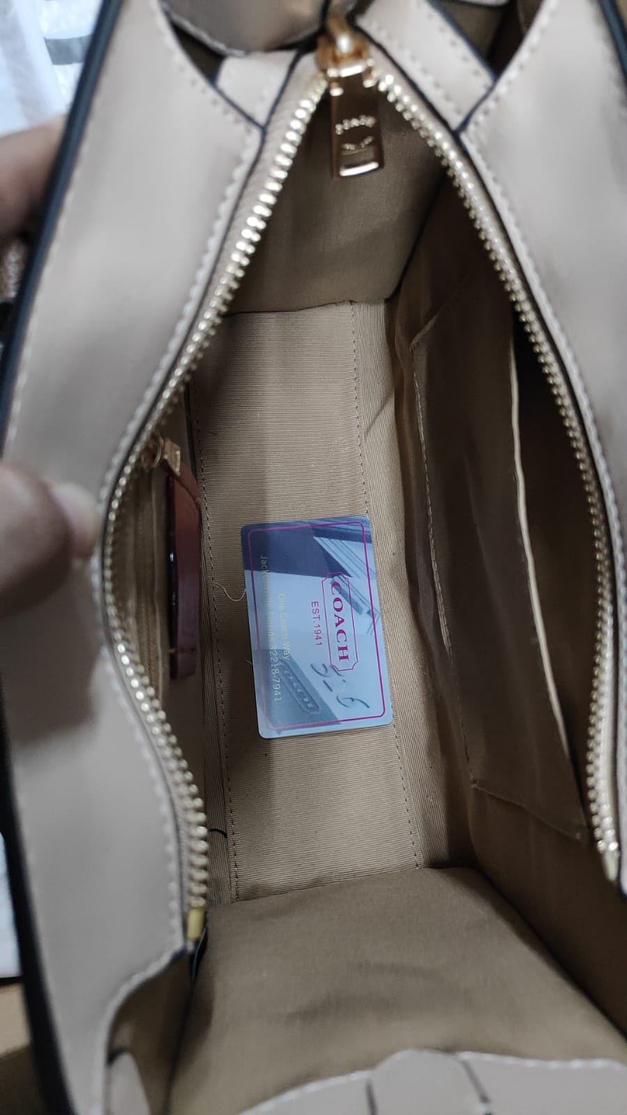 Coach Maggie tote zip closure and interior detail