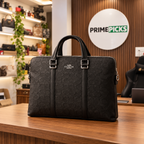 Coach black signature laptop bag in the PrimePicks office