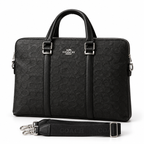 Coach black signature laptop bag on a clean white background