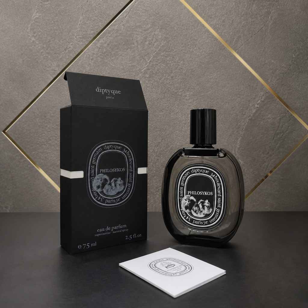 Diptyque Philosykos Eau de Parfum 75ml with box and booklet on stone and gold office wall