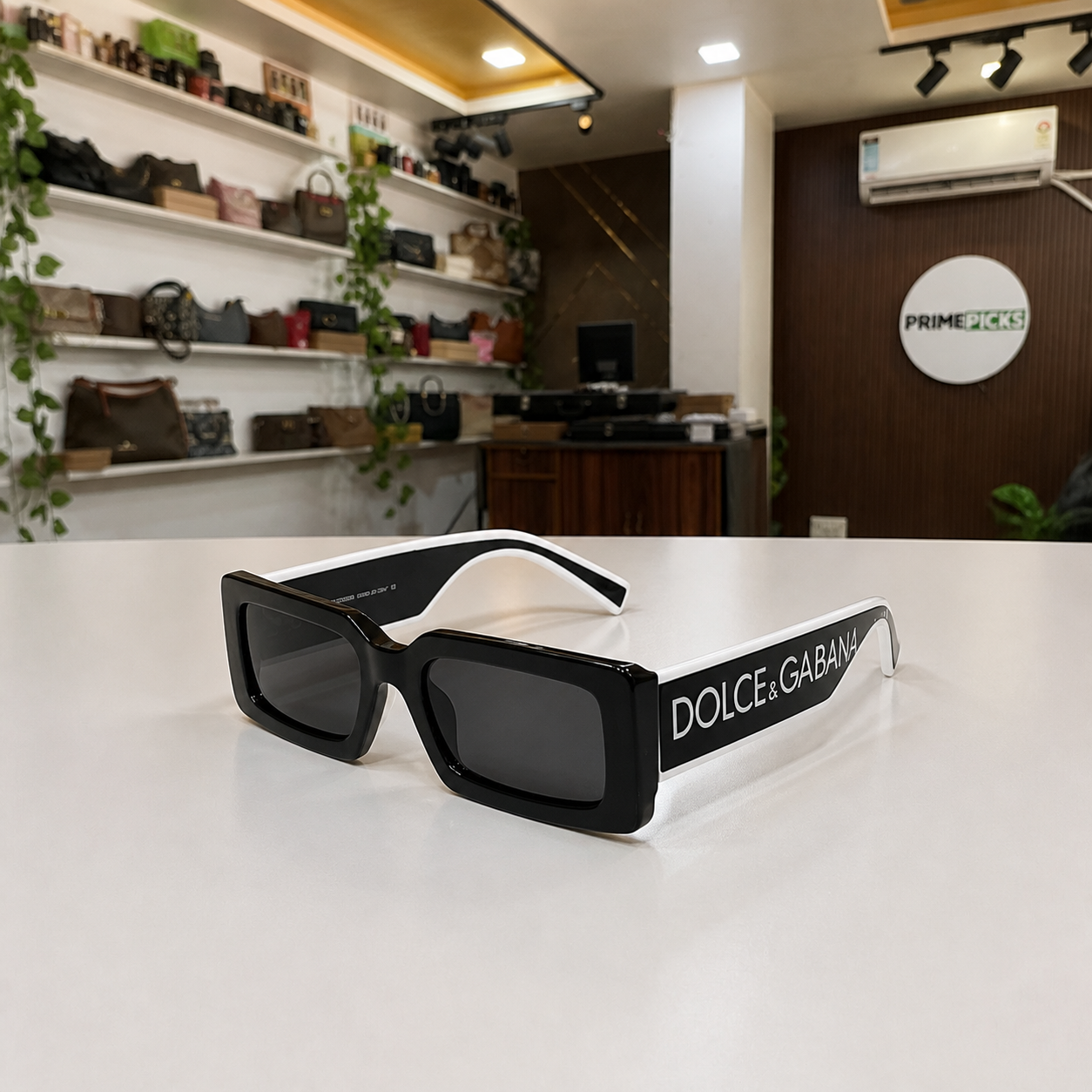 Dolce & Gabbana black sunglasses product-only PrimePicks office lifestyle