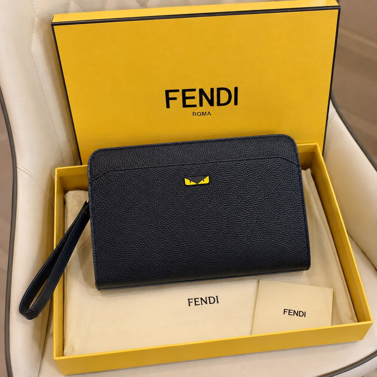 Fendi men’s black zip pouch with included brand box, bill and packaging