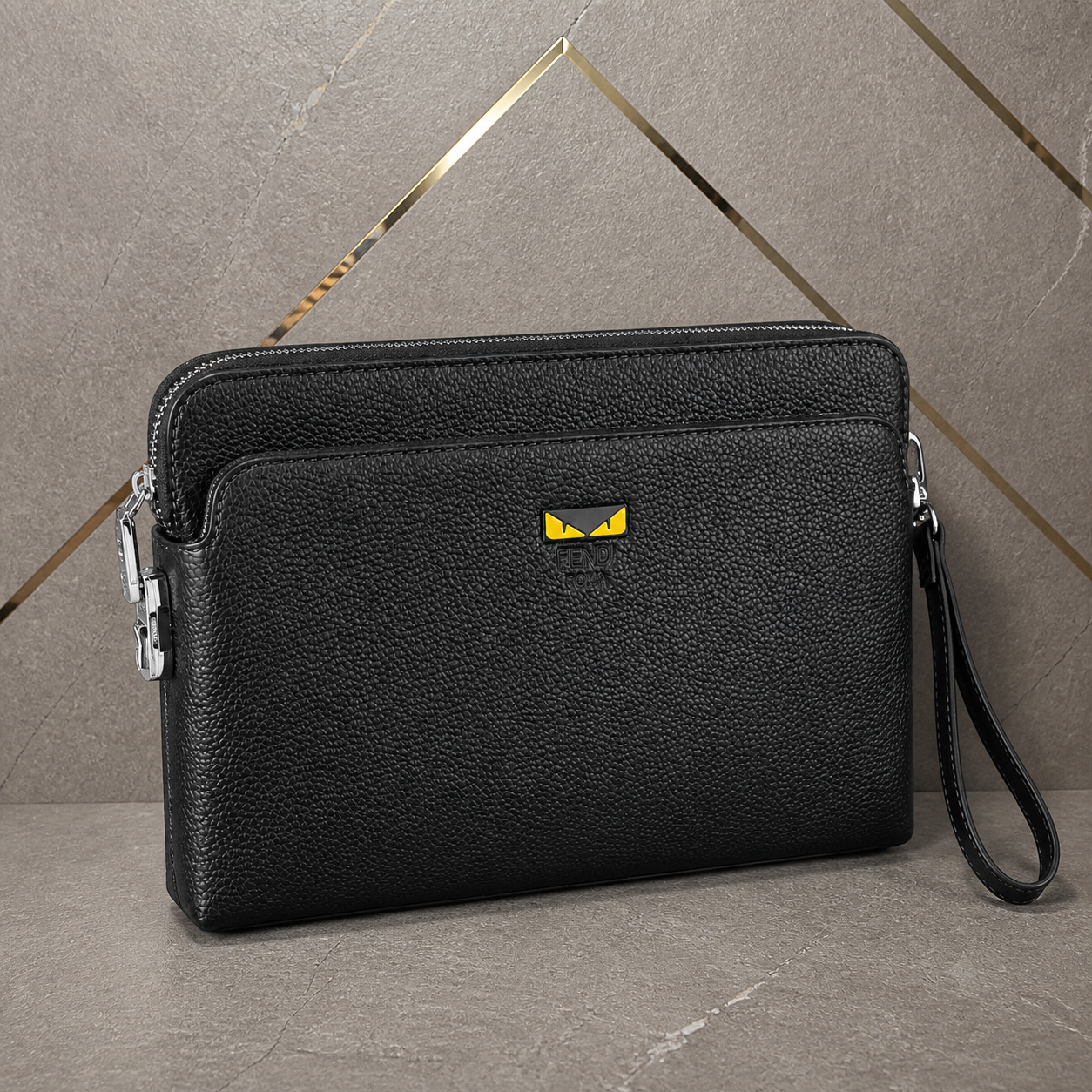 Fendi Monster Eyes pouch dual-zip and hardware detail