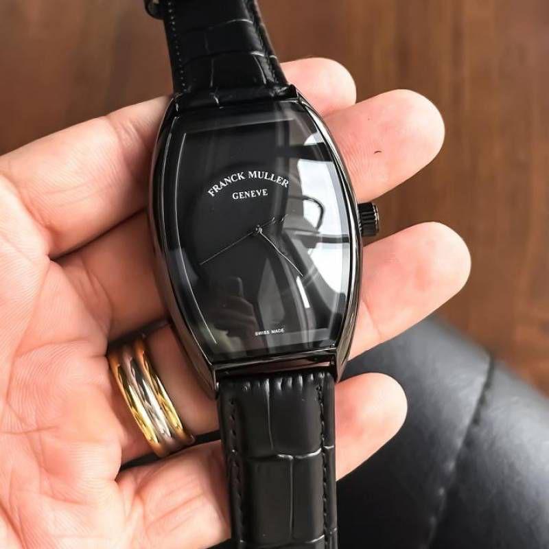 Original handheld front view of Franck Muller Curvex Piano-style full-black watch