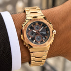 Casio G-Shock GMC-B2100D rose-gold-tone watch worn on wrist