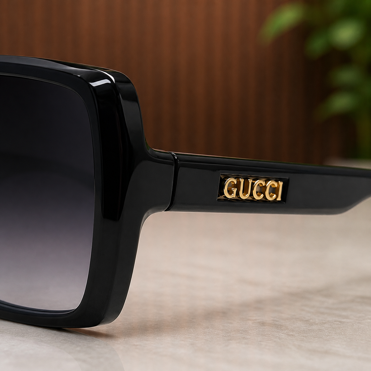 Gucci black sunglasses gold logo temple detail