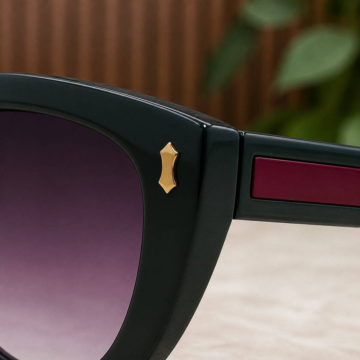 Gucci cat-eye sunglasses gold hinge and burgundy stripe detail