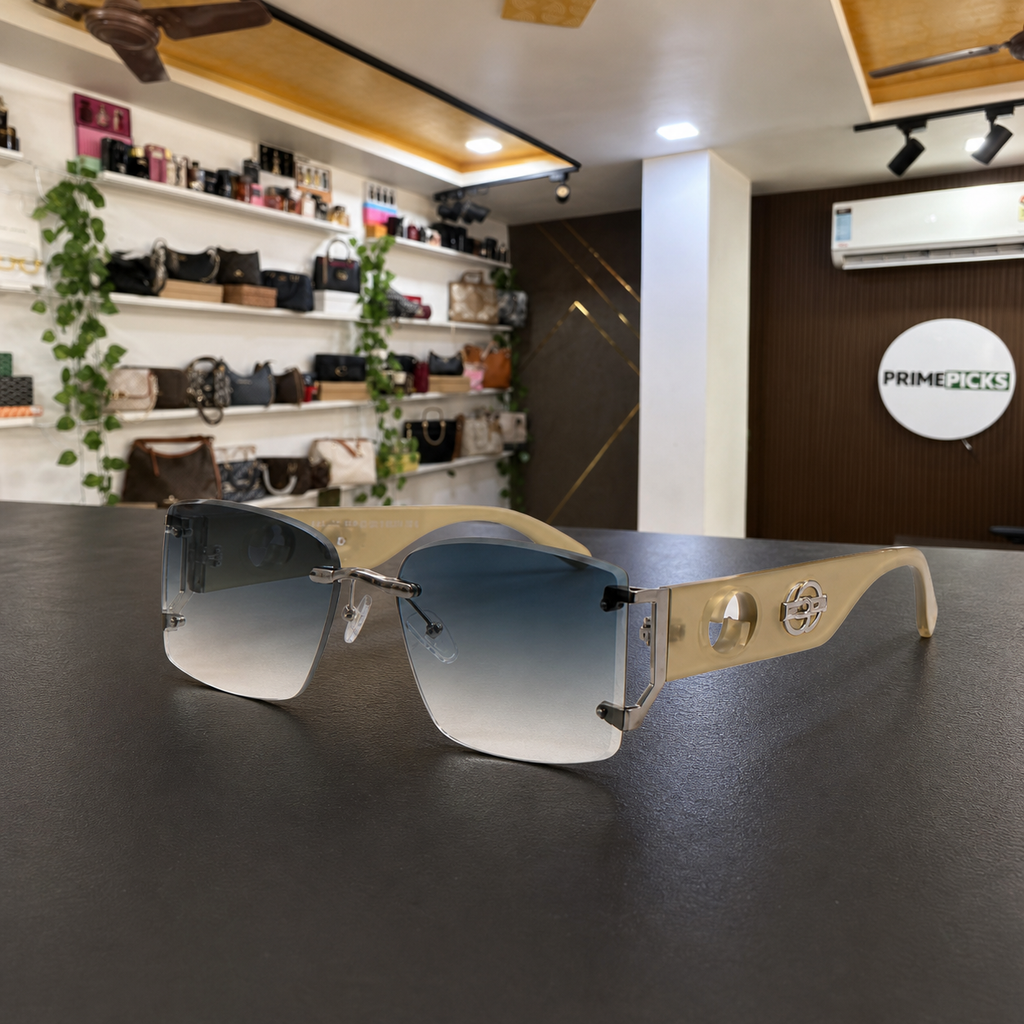 Gucci rimless shield sunglasses in beige and smoke grey, PrimePicks office display